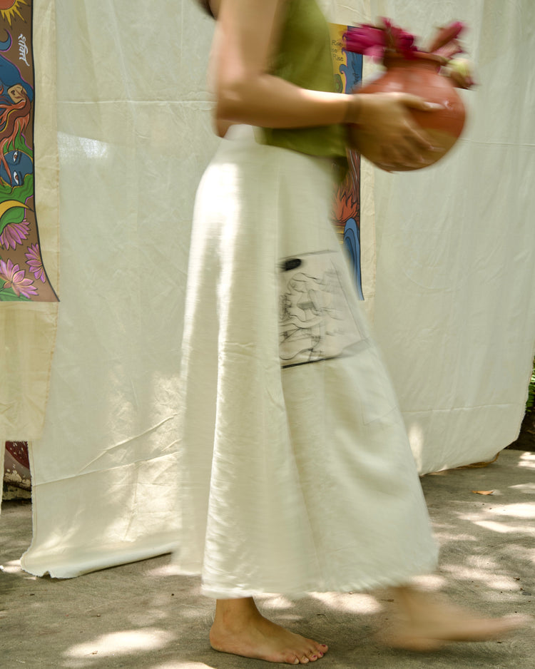 Hand-drawn nature and mythology prints for linen skirts and cotton flex pants, made to order in India. Slow fashion by The Manuscripts. Wide leg,